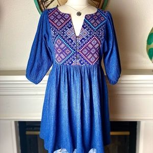 New with tags-peplum denim color top